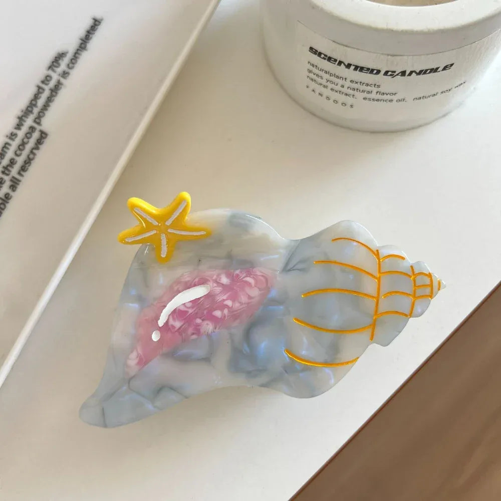 Large acetate conch shell hair claw clip with starfish accent - View 6 | TEVQA