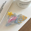 Large acetate conch shell hair claw clip with starfish accent - View 6 | TEVQA