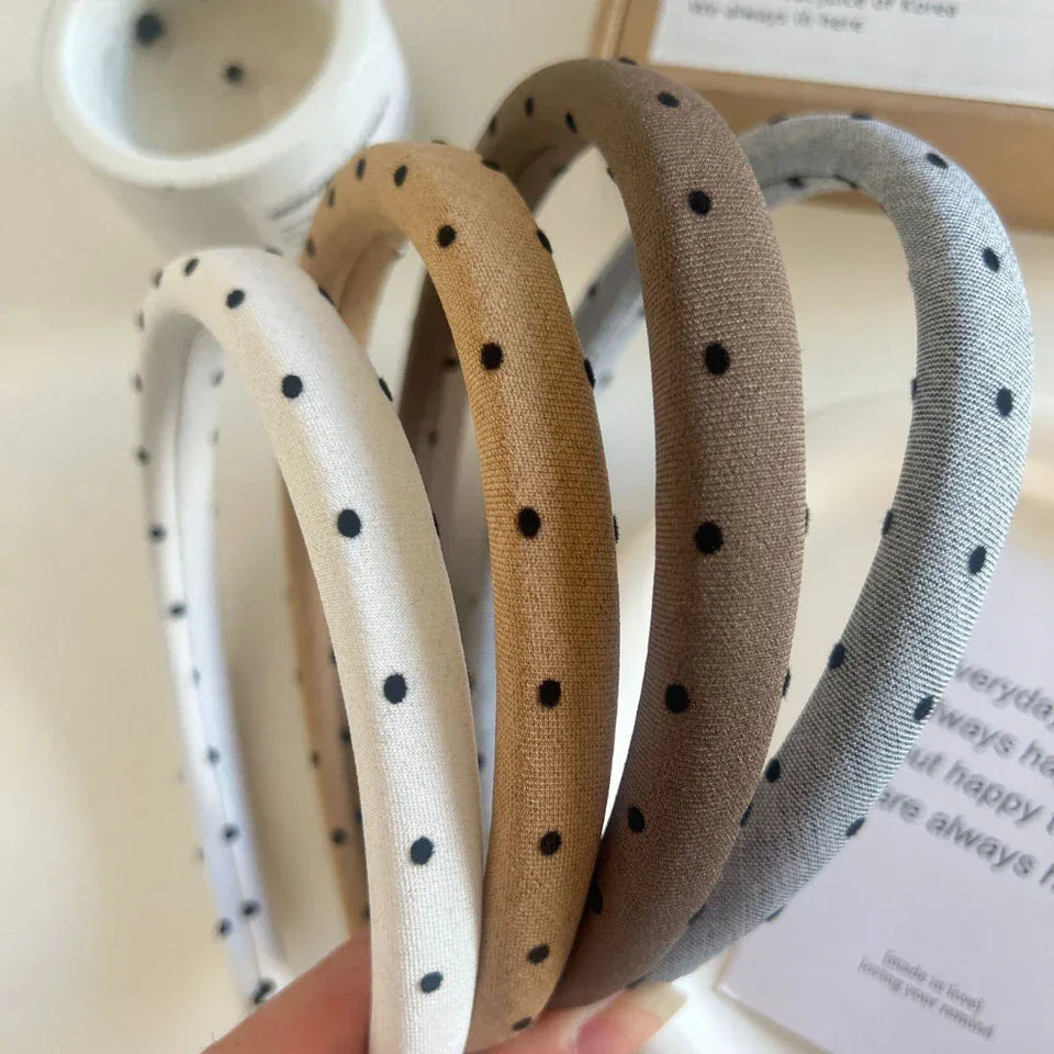 Collection of four padded polka dot headbands in cream, tan, brown, and grey Secondary image