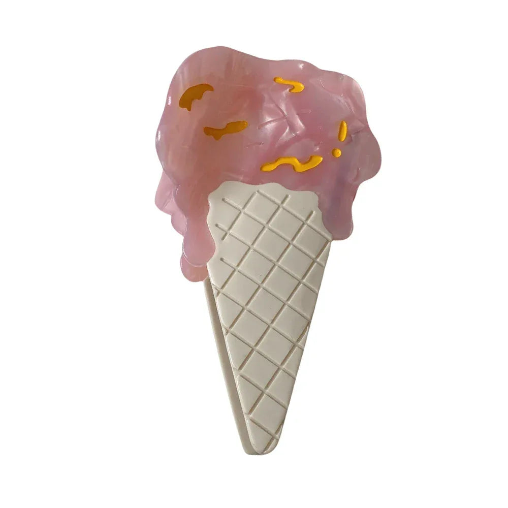 Pink ice cream cone hair clip with yellow drizzle