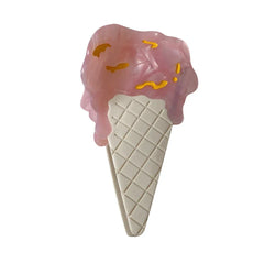 Pink ice cream cone hair clip with yellow drizzle