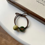 Decorative double-strand hair tie with retro green acrylic beads and a choice of charms - View 8 | TEVQA