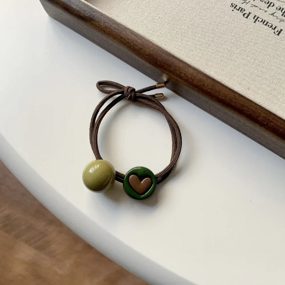 Decorative double-strand hair tie with retro green acrylic beads and a choice of charms - View 8 | TEVQA