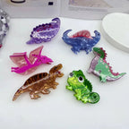 collection of acrylic dinosaur hair clips in various colors and styles