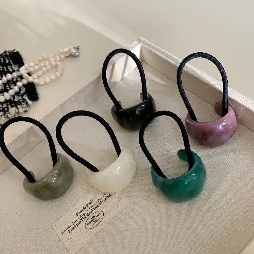 Group of stylish resin hair accessories