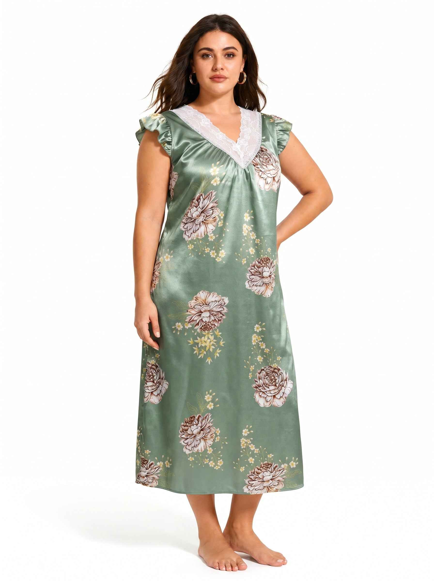 Side profile of a woman in a green floral satin nightgown