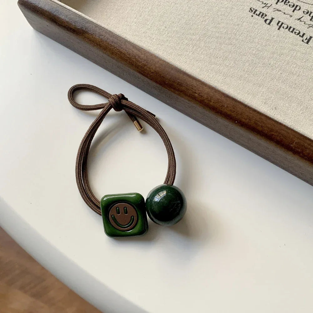 Decorative double-strand hair tie with retro green acrylic beads and a choice of charms - View 7 | TEVQA