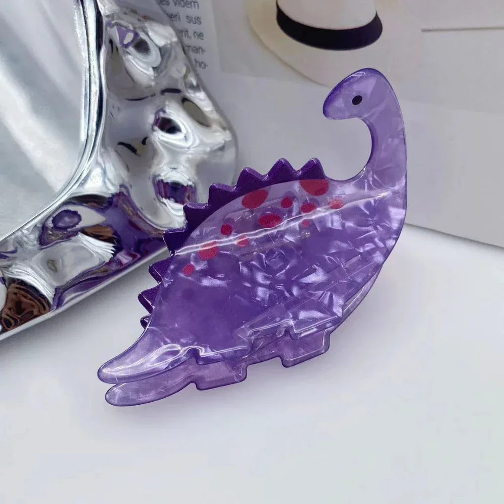 purple acrylic dinosaur hair clip with red spots