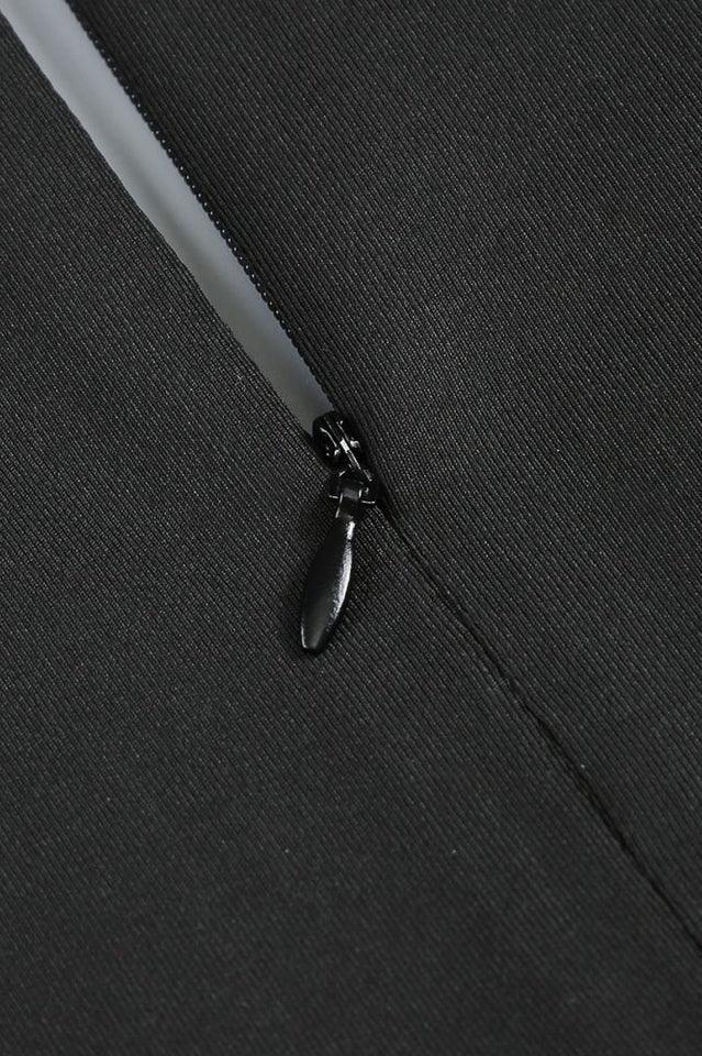 Close-up of a black zipper closure on a formal dress.