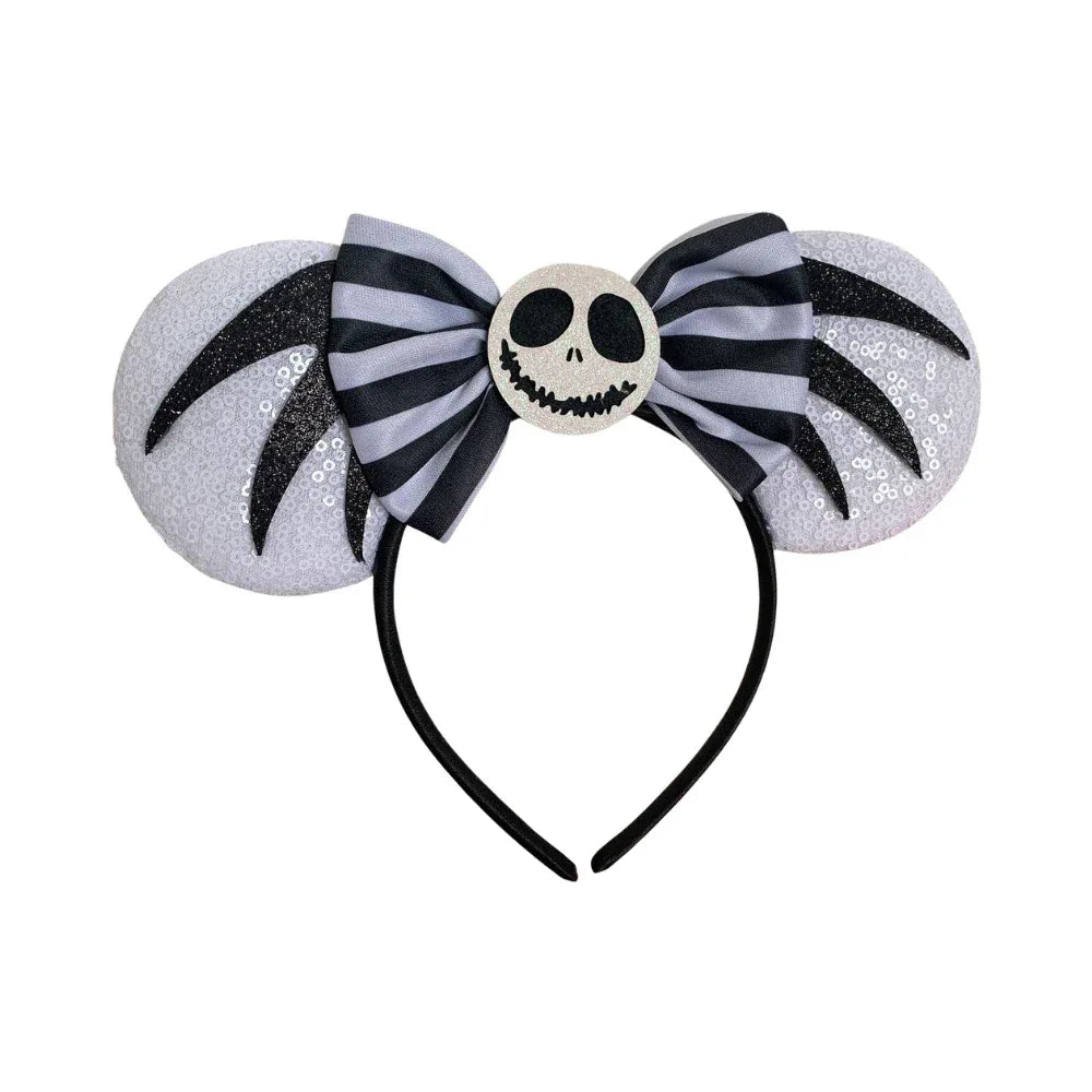 Jack Skellington inspired Mickey Mouse ear headband with black and white stripes and sequins.