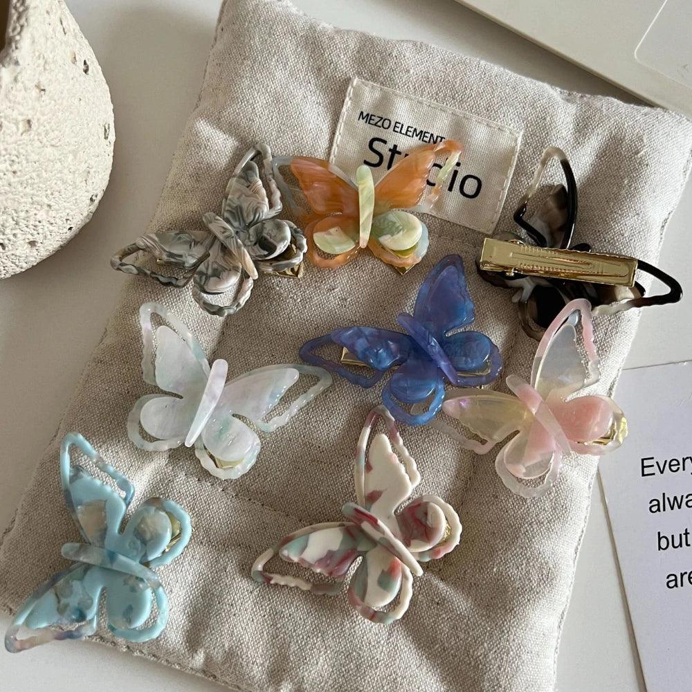 collection of assorted translucent butterfly hair clips