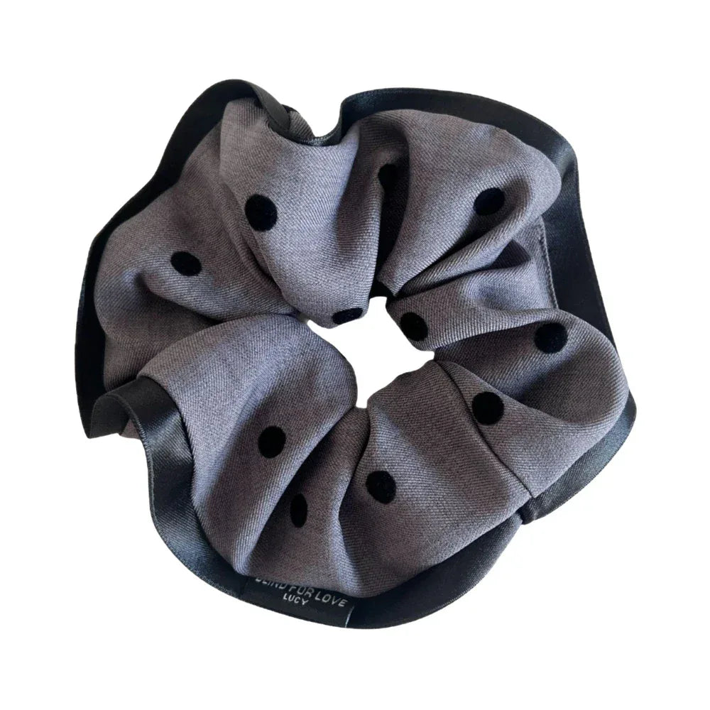 Gray polka dot scrunchie with black trim