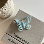 Iridescent butterfly hair clip made of acetate - View 12 | TEVQA