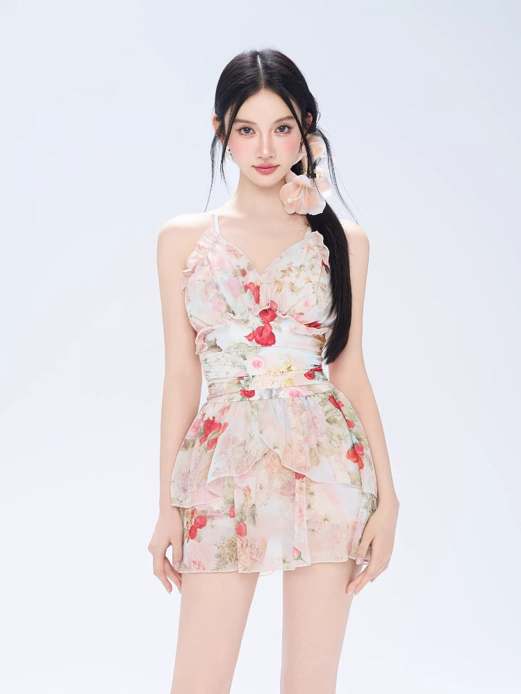 Front view of a woman wearing a floral print mini dress