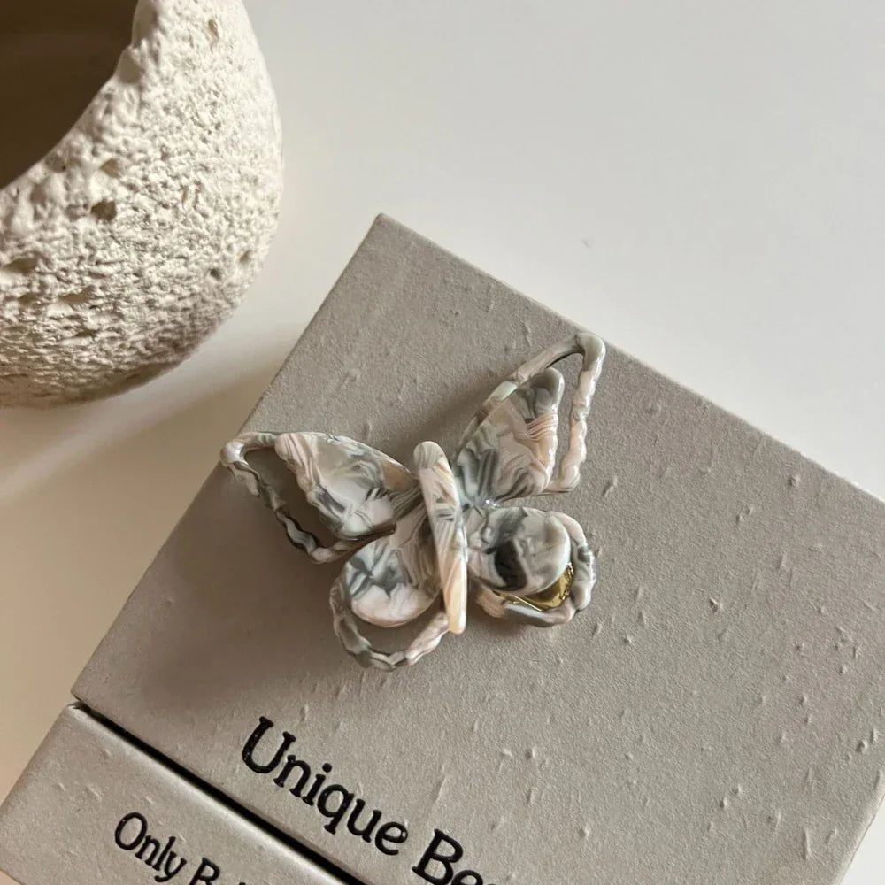 Iridescent butterfly hair clip made of acetate - View 10 | TEVQA