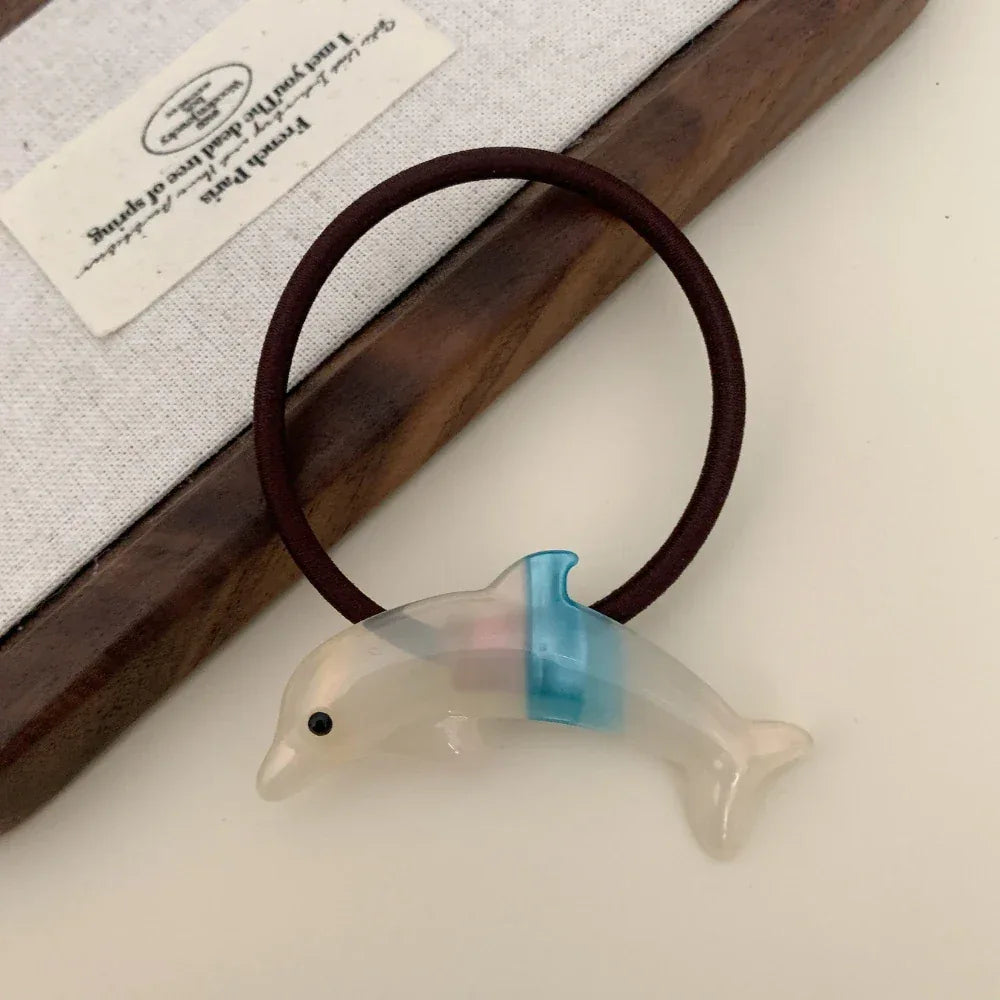 Pearlescent dolphin charm hair tie - View 9 | TEVQA