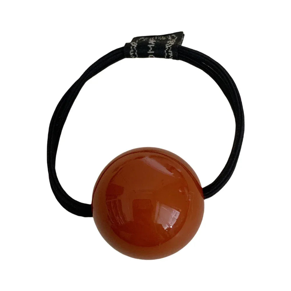 Single brown ball hair tie