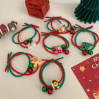 Various Christmas hair ties featuring holiday characters and jingle bells
