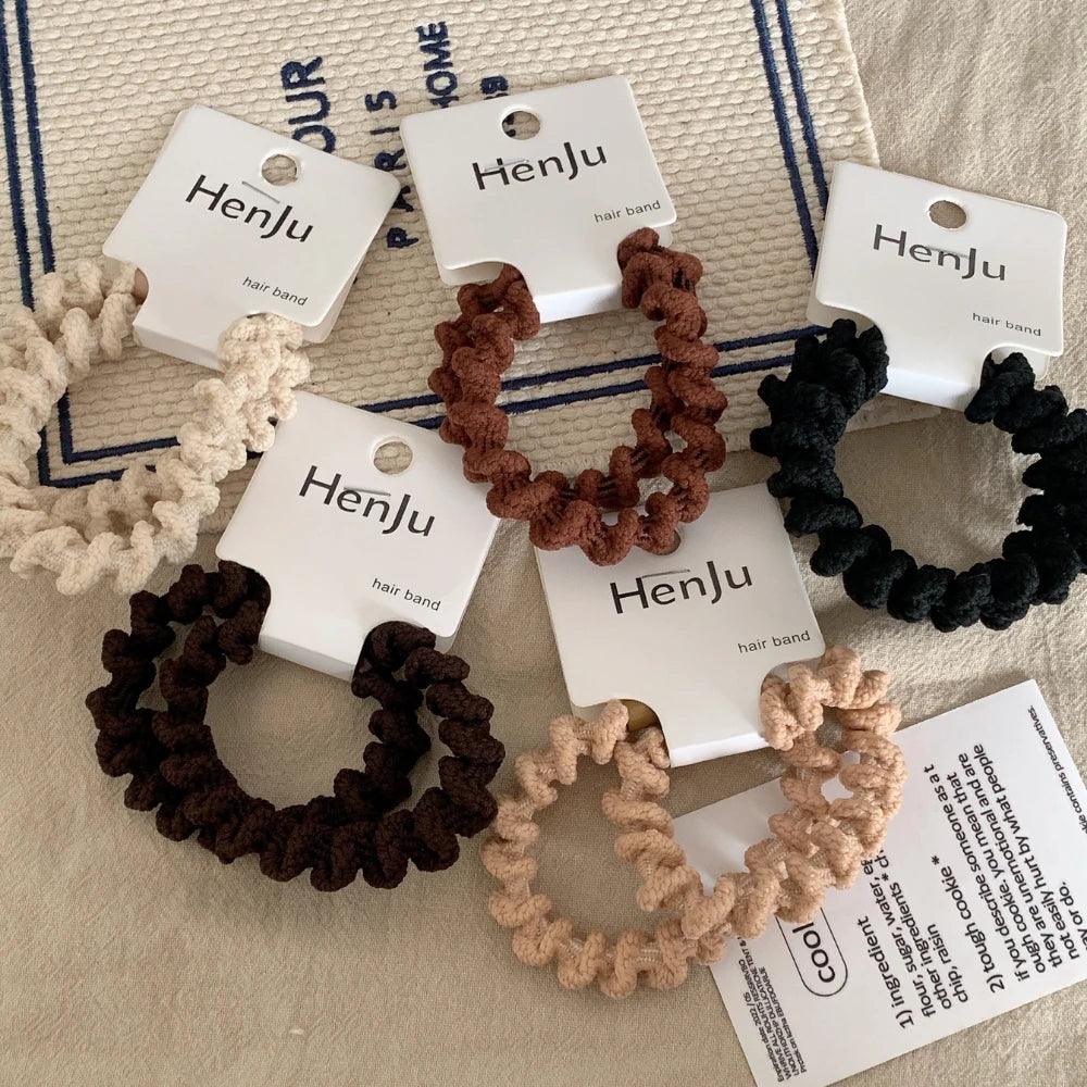 Scattered spiral hair ties in different colors
