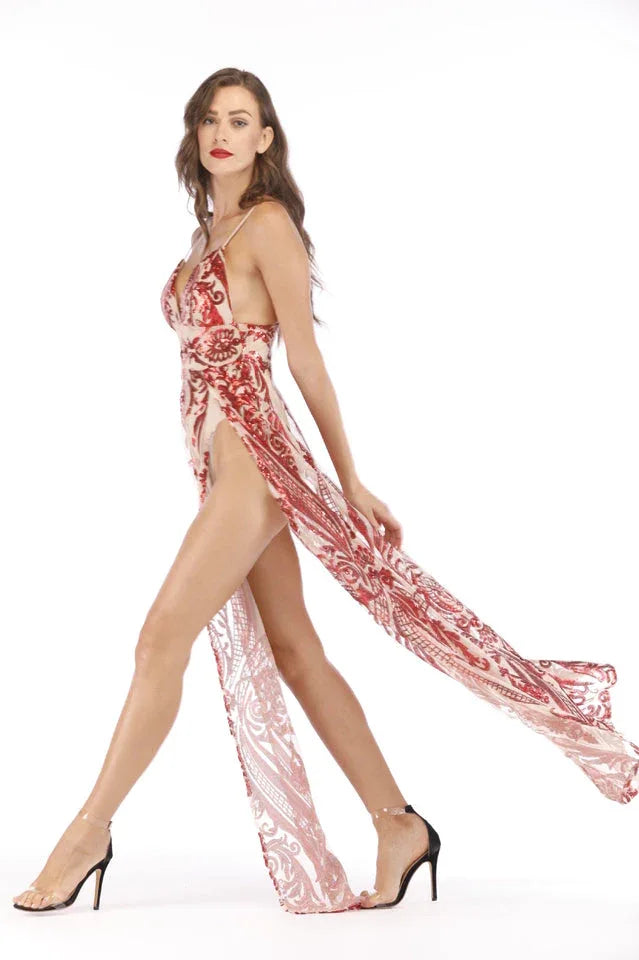 Woman walking in a flowing, floor-length sequined dress with a high slit, highlighting the movement of the fabric.