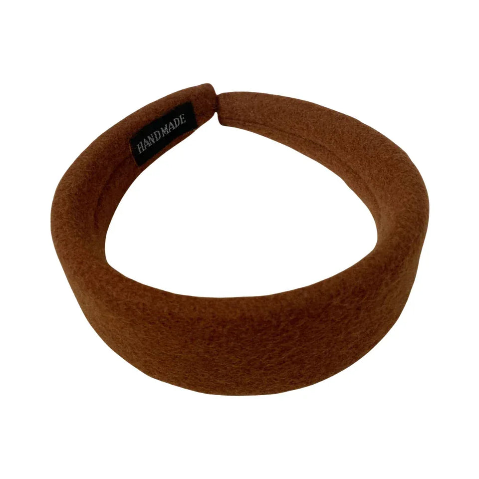 Brown padded felt headband with 'HANDMADE' label Main image