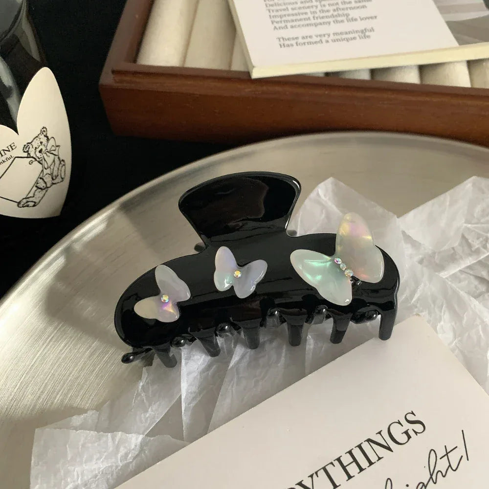 Black butterfly hair claw clip with iridescent accents - View 6 | TEVQA