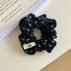 Large floral lace scrunchie with ruffled edges and eyelet trim - View 8 | TEVQA