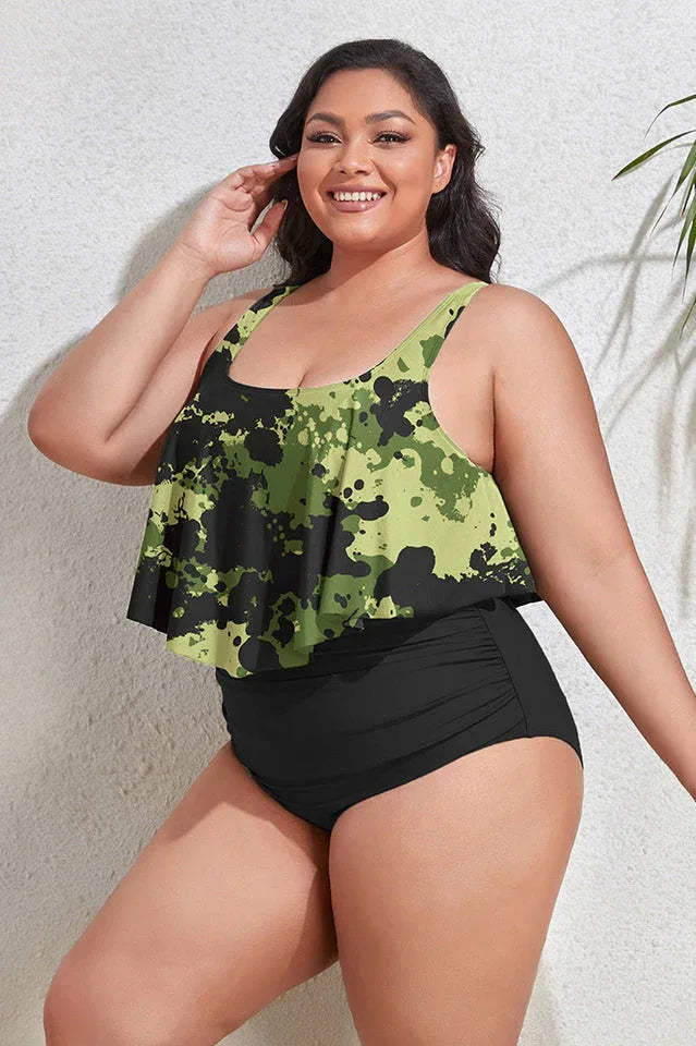 Plus-size tankini swimsuit with camouflage print ruffled top and black ruched bottom