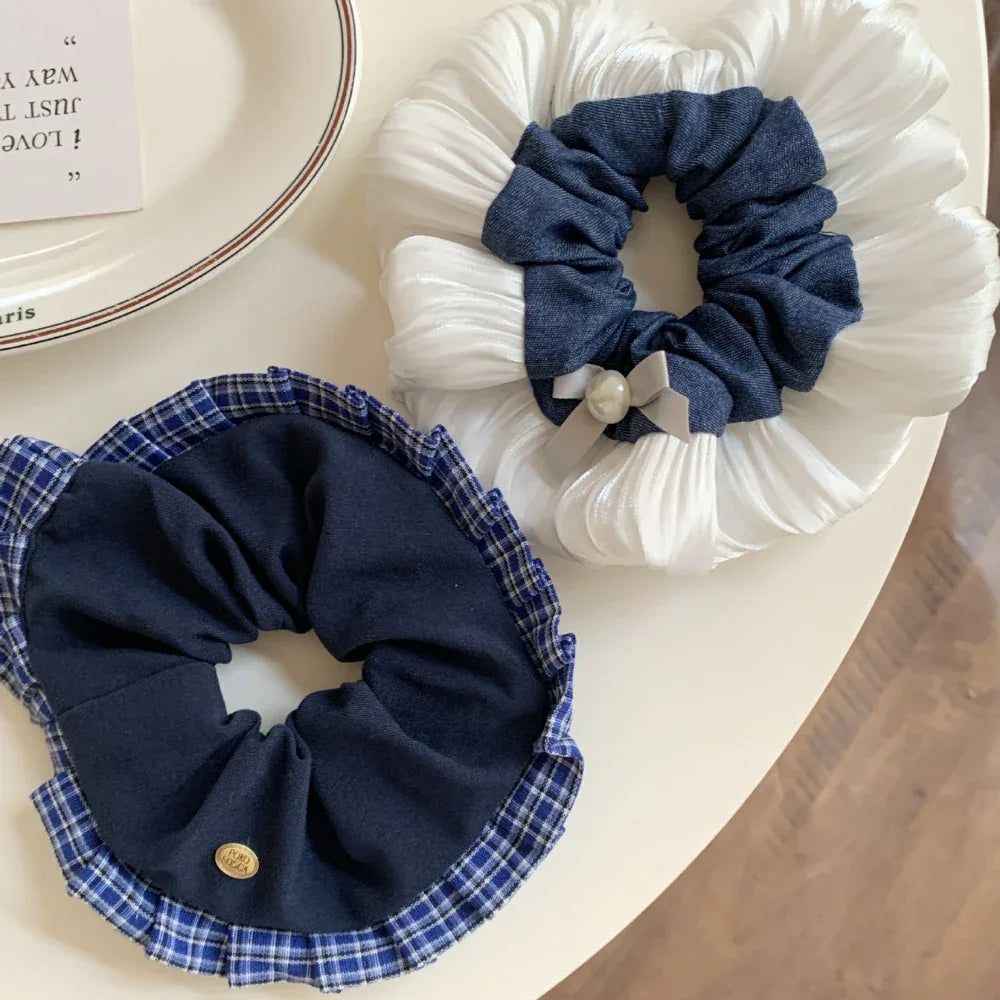 Overhead view of two scrunchies on a table