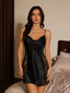 Front view of a black satin and lace slip dress with a cowl neck.
