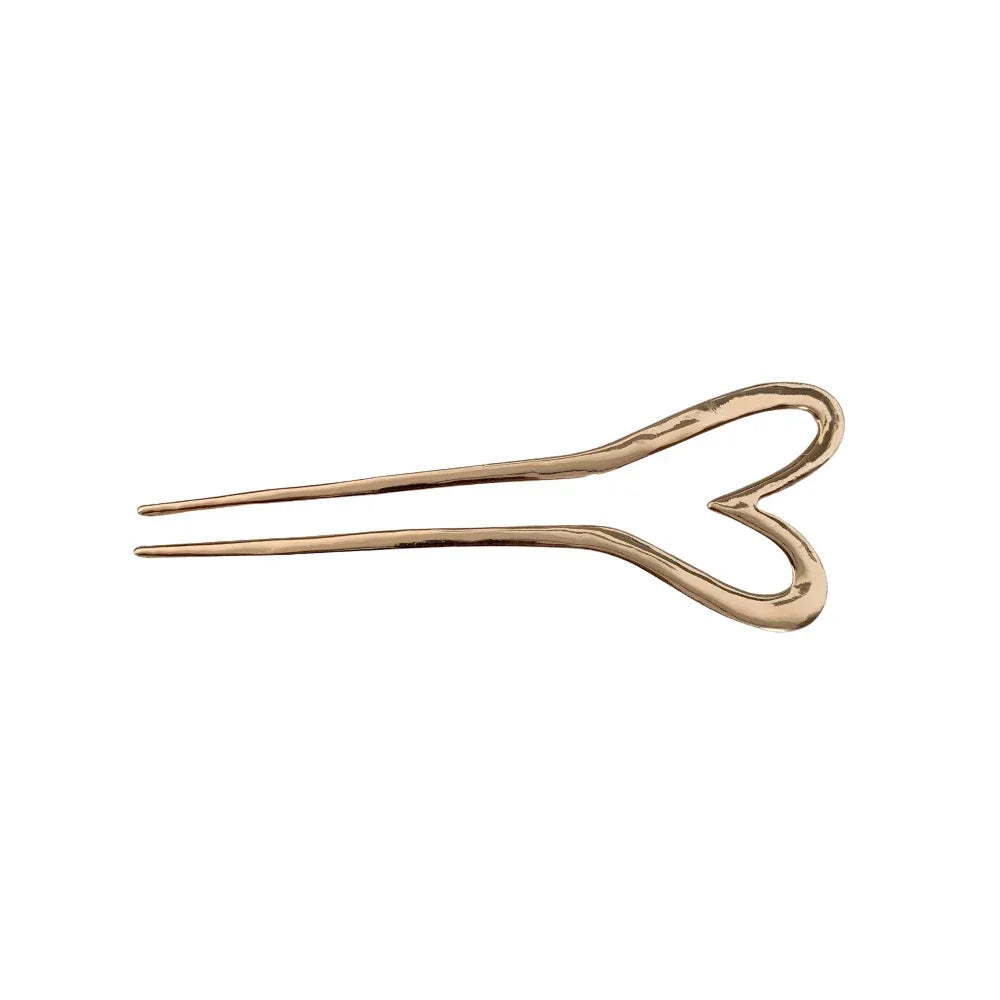 A single gold-tone heart hairpin with two prongs, isolated on a white background.