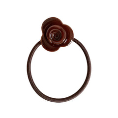 A single brown rose hair tie on a white background.