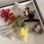 Assorted acetate claw hair clips in various colors and patterns, each with "FRANCE Handmade" inscription