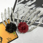 Skeleton hand hair clips with red and black flowers