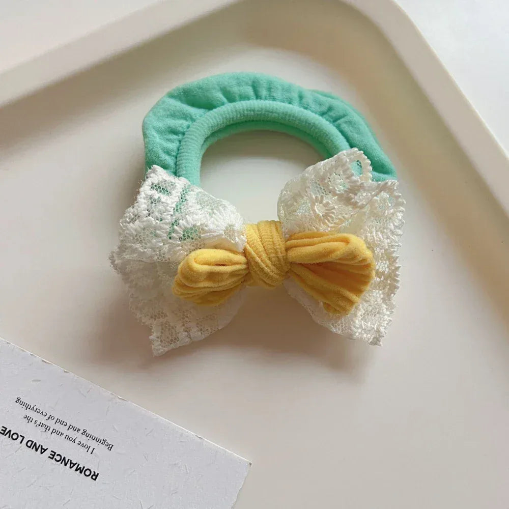Dainty lace bow scrunchie with terry cloth base - View 9 | TEVQA