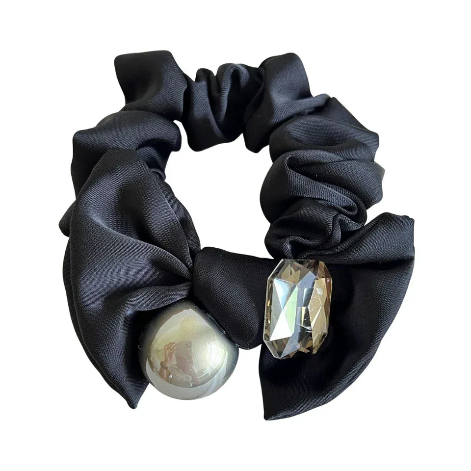 Black satin scrunchie with a metallic sphere and crystal embellishment Main image