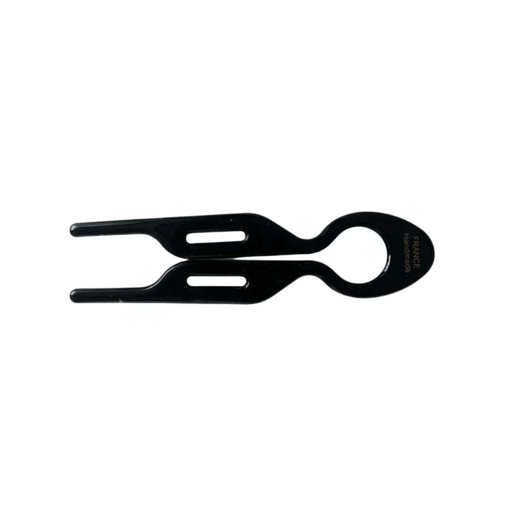 Black resin tweezers with a loop handle and two-pronged tip, isolated on a white background.