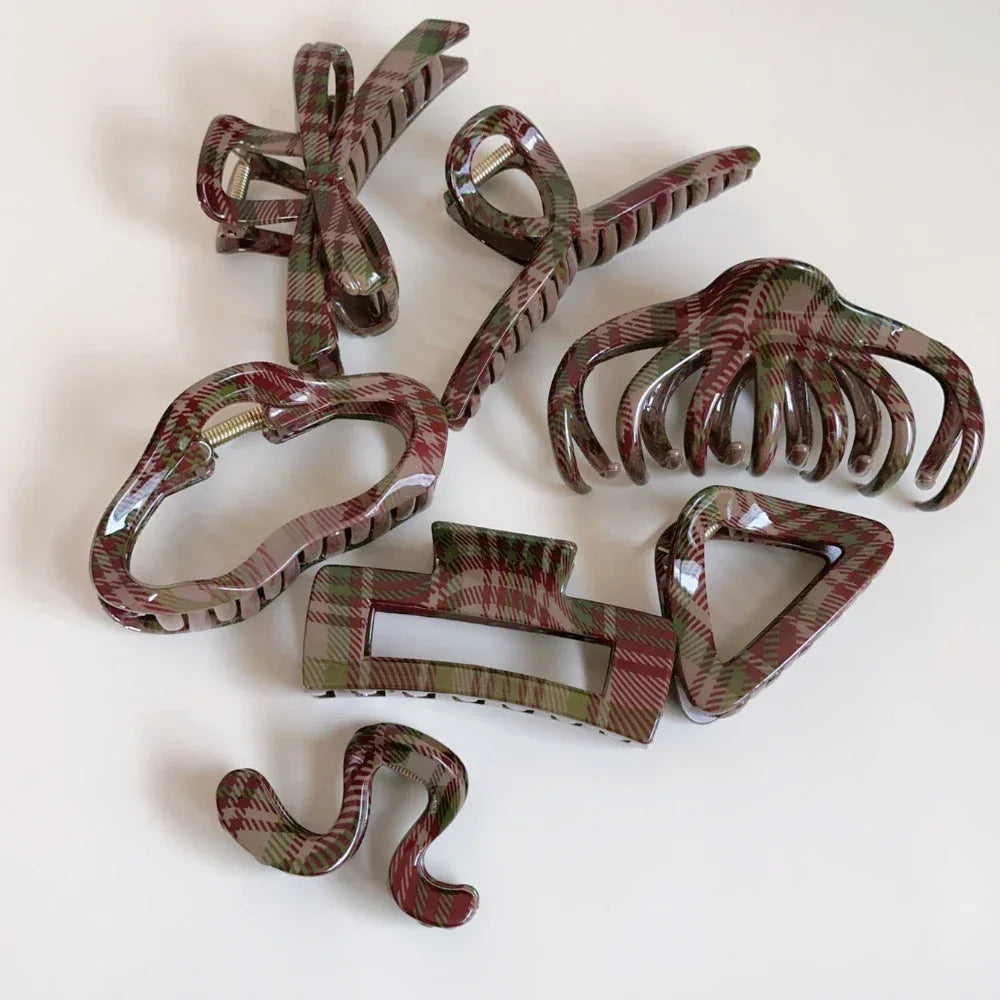 Collection of plaid hair accessories including claw clips and barrettes