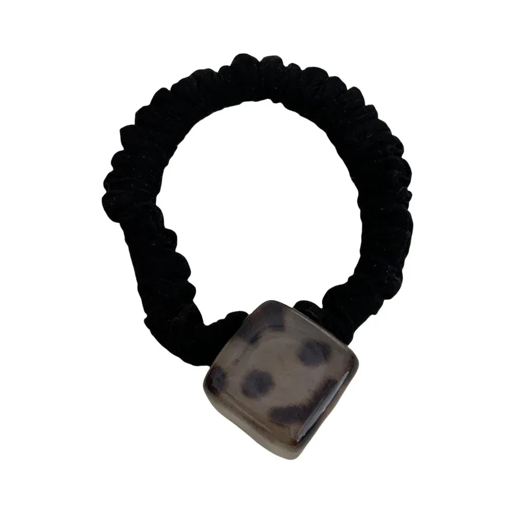 Black velvet scrunchie with a square leopard print pendant