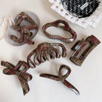 Assortment of plaid hair claw clips in various shapes