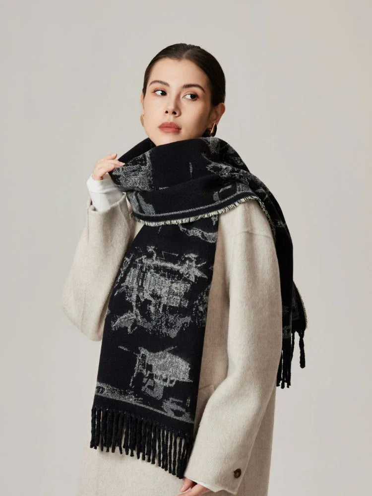 Close-up of a woman adjusting a black and white patterned scarf