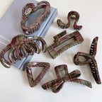Group of plaid hair claw clips with different designs