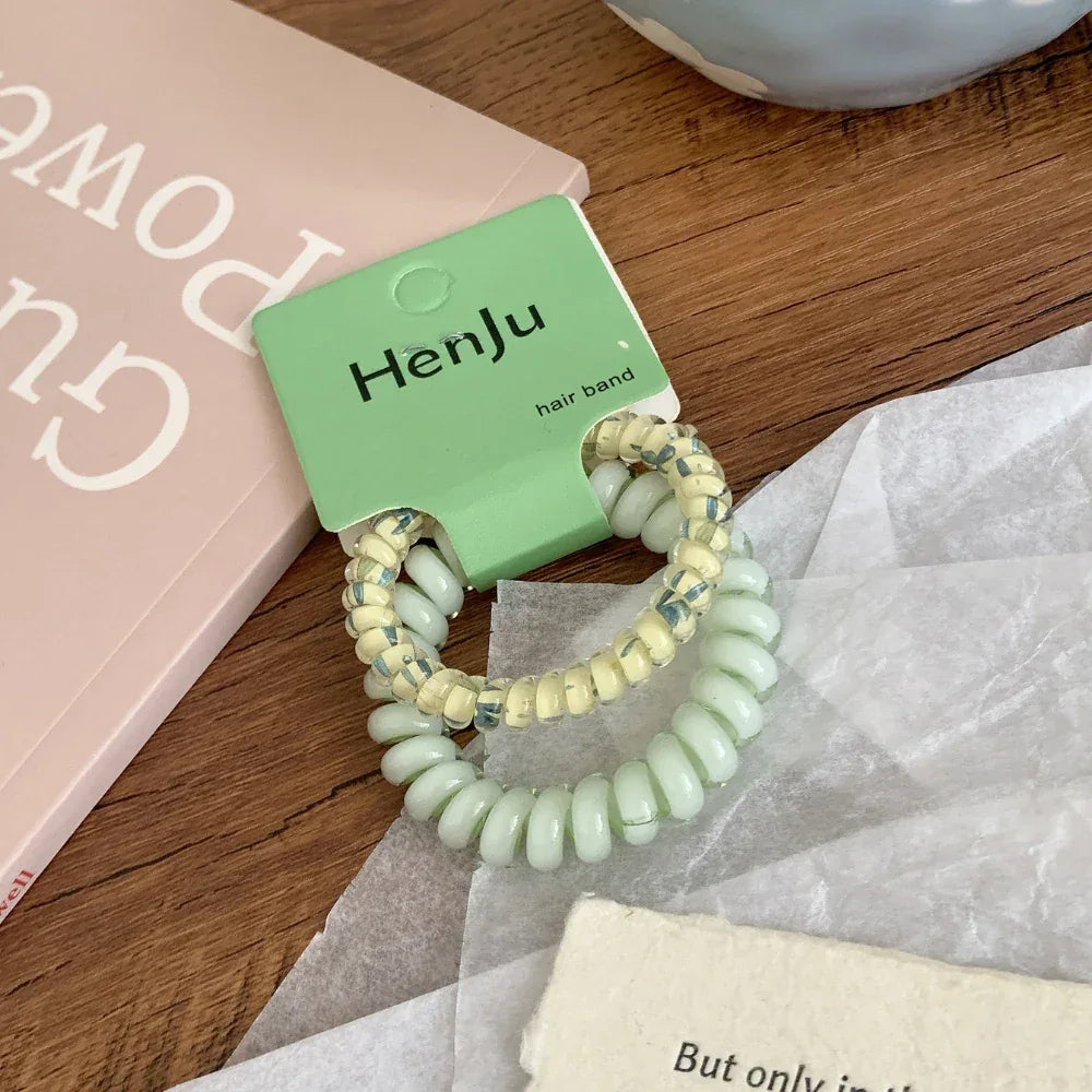 Ditsy floral spiral hair tie in pastel color - View 9 | TEVQA