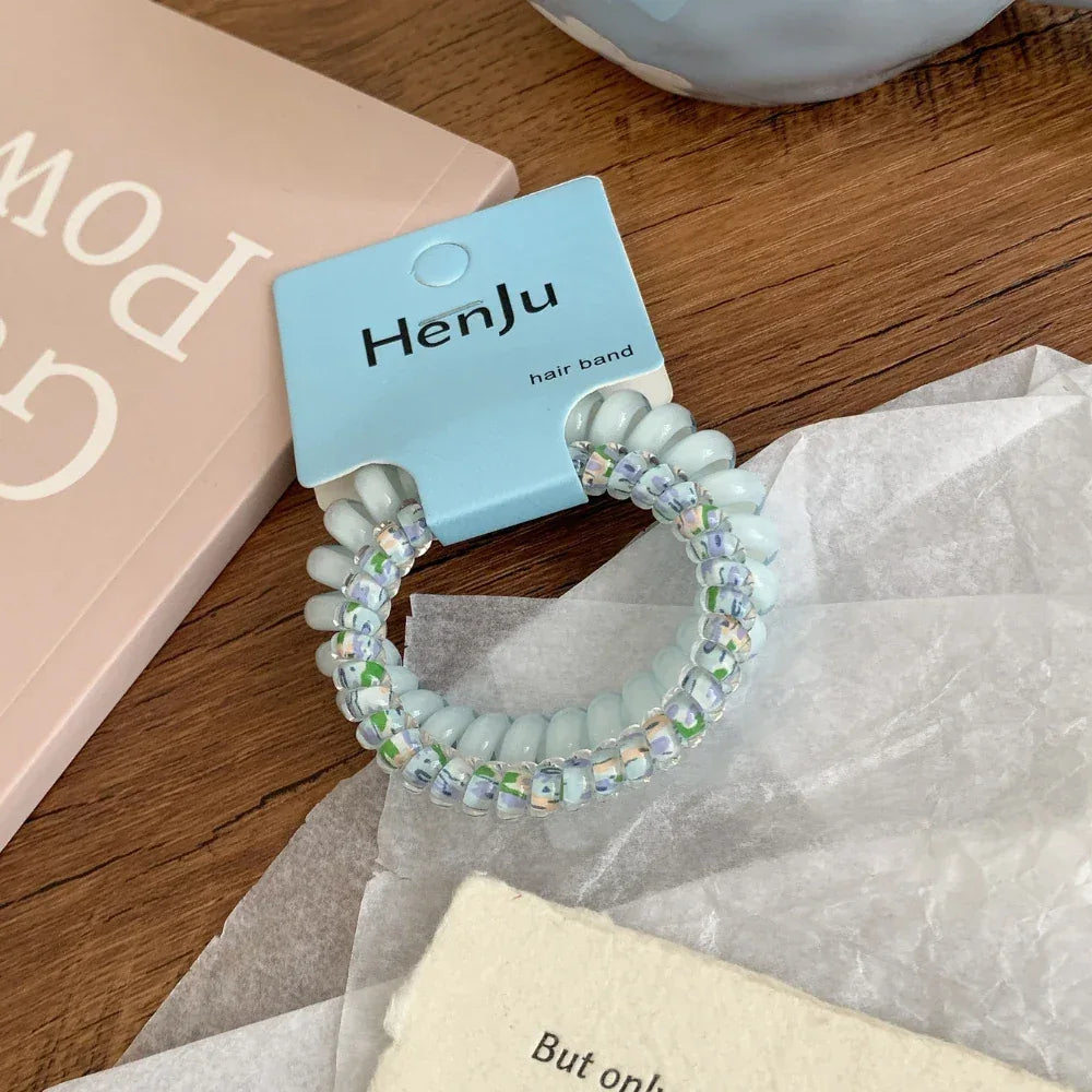 Ditsy floral spiral hair tie in pastel color - View 6 | TEVQA