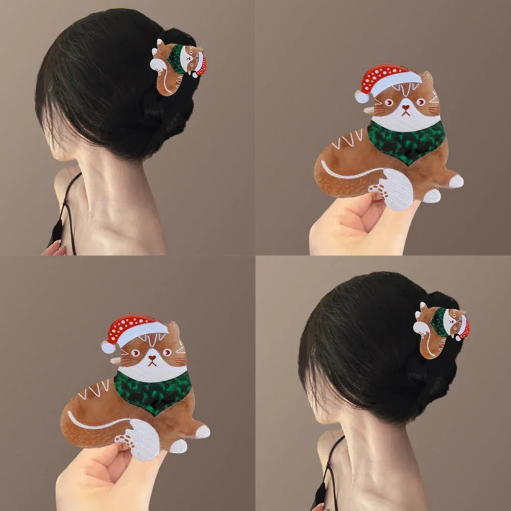Woman with an updo hairstyle wearing a decorative cat hair clip.