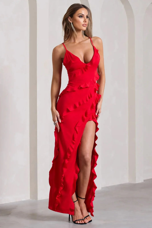 woman in a long red satin dress with ruffles and a high slit