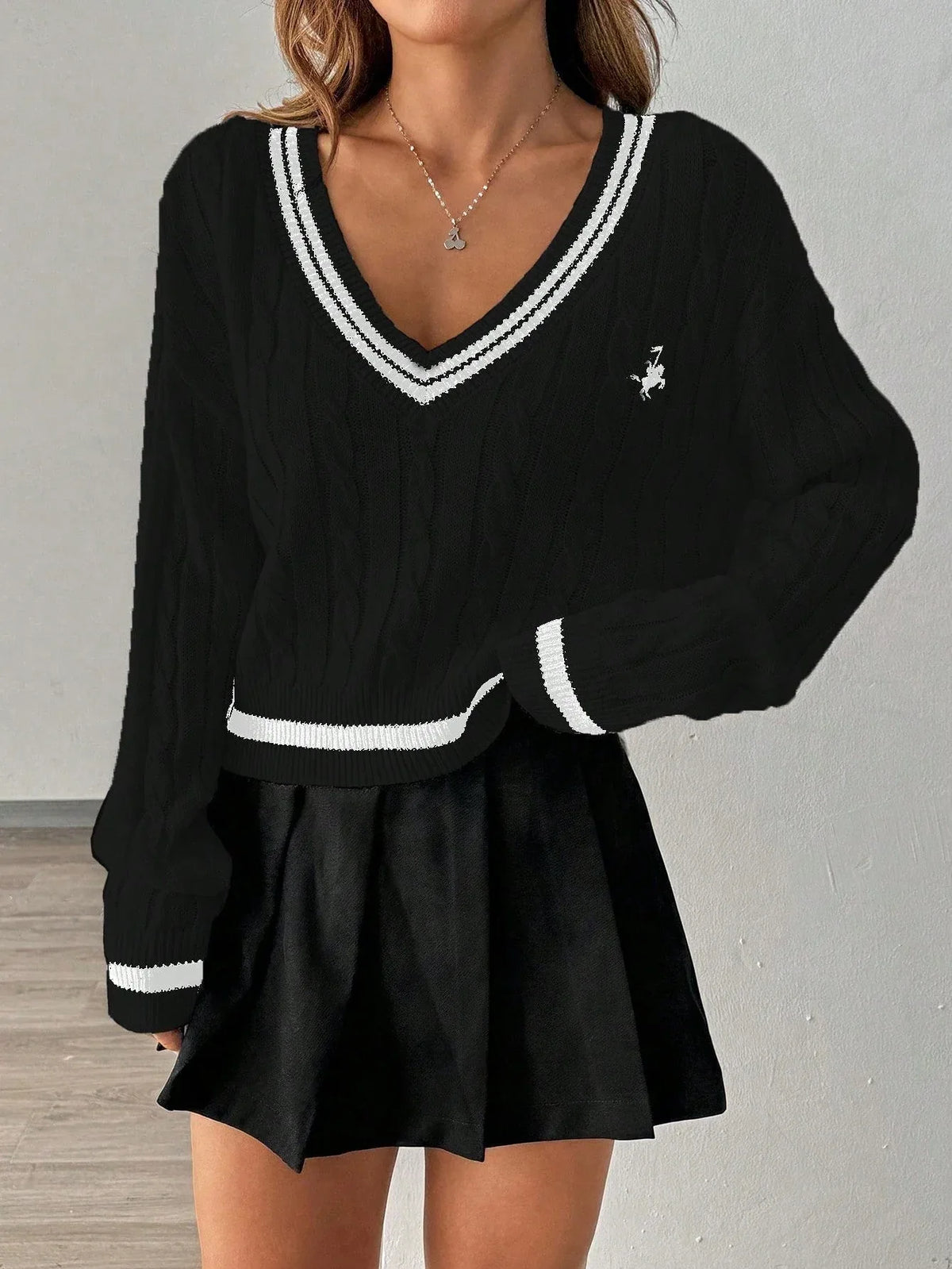 White cable knit V-neck sweater with black trim and embroidered crest - View 8 | TEVQA