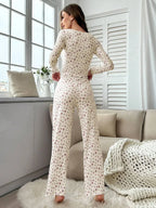 Back view of a woman in a floral print pajama set