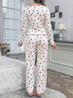 Back view of a woman wearing white floral print pajamas