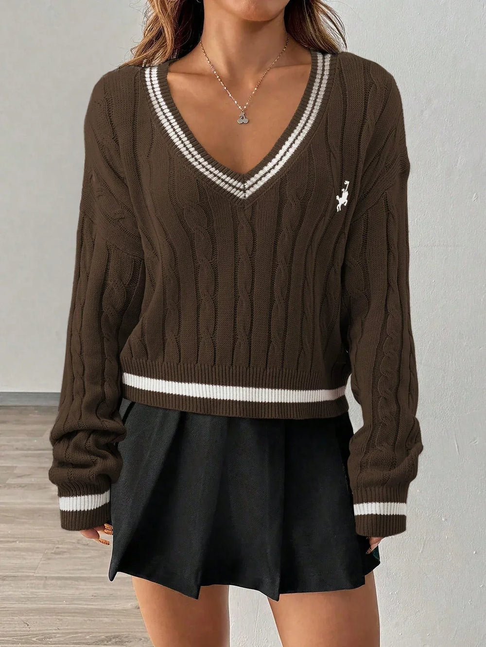 White cable knit V-neck sweater with black trim and embroidered crest - View 9 | TEVQA